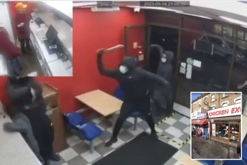 Terrifying moment thugs wielding machetes storm chicken shop and attack man
